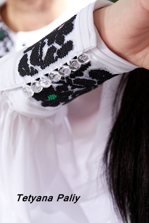 Solya's dress and Tikhon's embroidered shirt