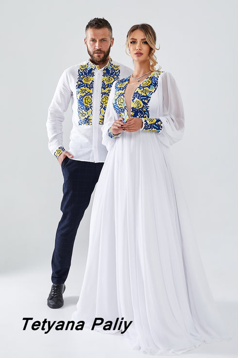 Zlata's dress and Zakhar's embroidered shirt