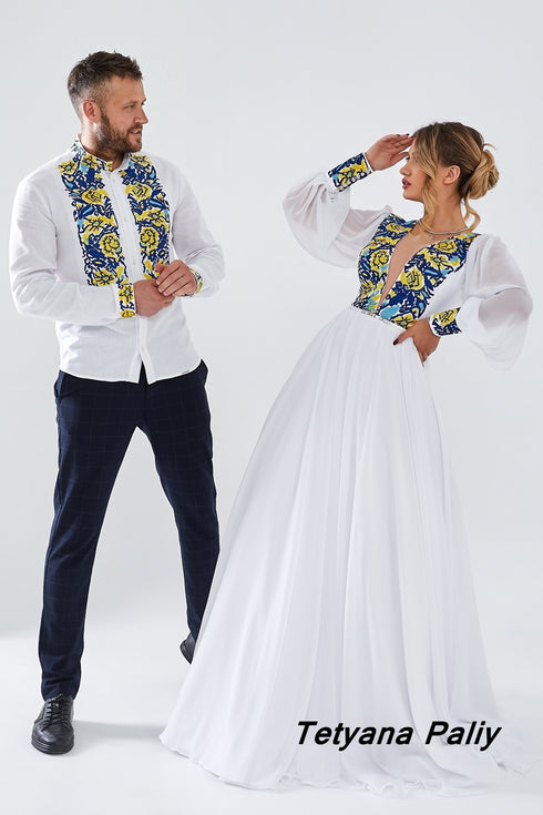 Zlata's dress and Zakhar's embroidered shirt