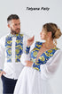 Zlata's dress and Zakhar's embroidered shirt