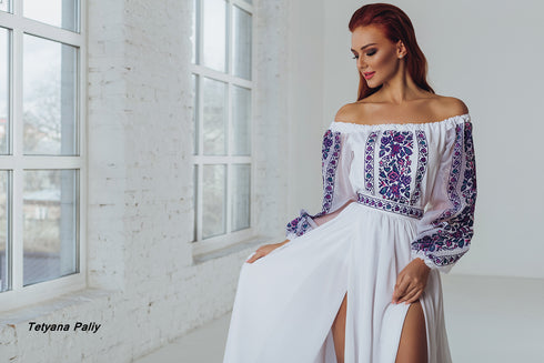 Berta women's set (blouse, belt, skirt), Dmytro men's shirt. The color of the embroidery is purple.