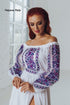 Berta women's set (blouse, belt, skirt), Dmytro men's shirt. The color of the embroidery is purple.