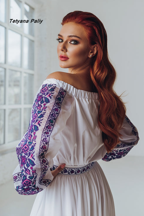 Berta women's set (blouse, belt, skirt), Dmytro men's shirt. The color of the embroidery is purple.